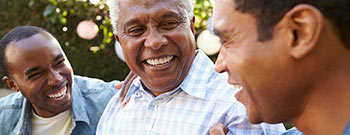 Dad with Sons - How Does a Graded Death Benefit Whole Life Insurance Policy Work?