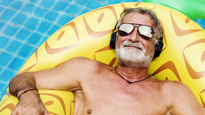 senior man in the pool - senior life insurance