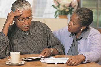 couple studying medicare supplemental insurance